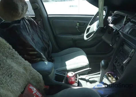 2001 Toyota Camry Le from USA, damaged, VIN 4T1BG22K81U853198